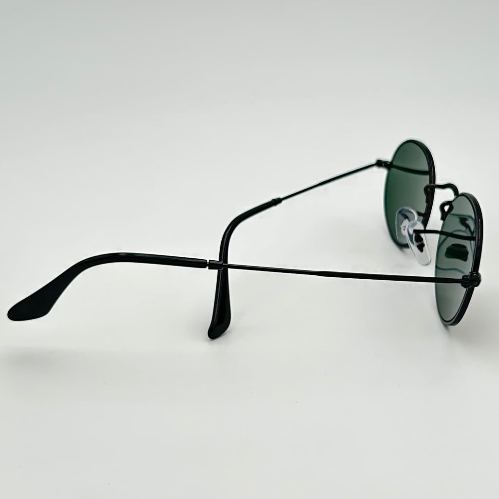 Vue de profil des lunettes Ray-Ban RB3547N, monture fine en métal noir